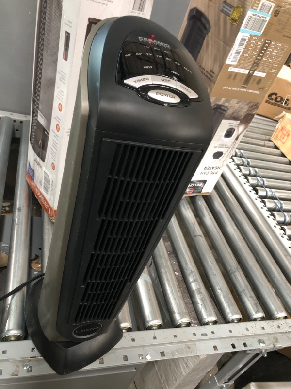 Photo 1 of Lasko Oscillating Ceramic Tower Space Heater for Home with Adjustable Thermostat, Timer and Remote Control, 22.5 Inches, Grey/Black, 1500W, 751320
