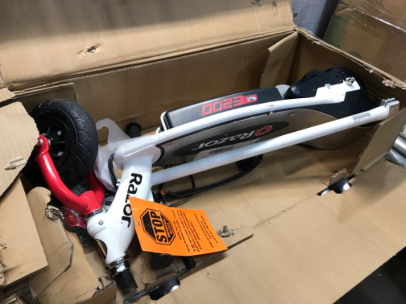 Photo 2 of ***PARTS ONLY***DAMAGED***
Razor E200 Electric Scooter - 8" Air-Filled Tires, 200-Watt Motor, Up to 12 mph and 40 min of Ride Time Standing Ride (E200) White