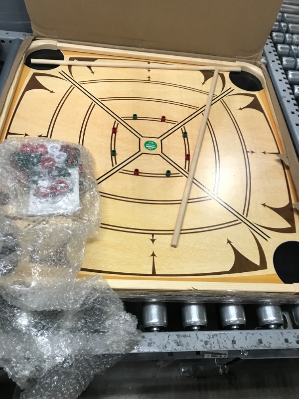 Photo 2 of Carrom Board Game - Wooden Strike and Pocket Game Set with Group of Black and Beige Coins, 2 Red Queen Coins, Striker Coin, and Cue Sticks by Hey Play