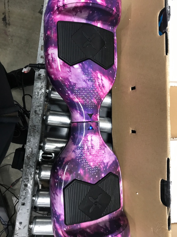 Photo 2 of **SEE NOTES**
Hover-1 Helix Electric Hoverboard | 7MPH Top Speed, 4 Mile Range, 6HR Full-Charge, Built-in Bluetooth Speaker, Rider Modes: Beginner to Expert Hoverboard Galaxy