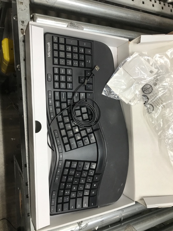 Photo 3 of Microsoft Ergonomic Keyboard - Black. Wired, Comfortable, Ergonomic Keyboard with Cushioned Wrist and Palm Support. Split Keyboard. Dedicated Office Key.