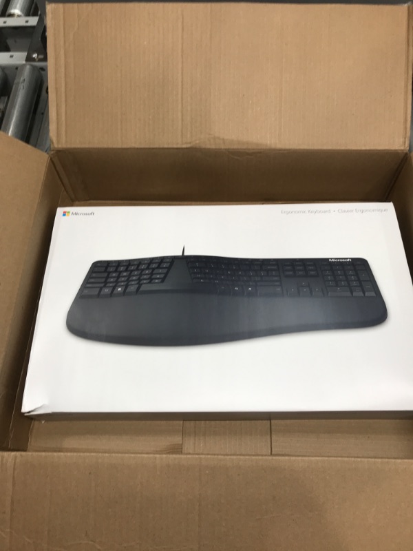 Photo 2 of Microsoft Ergonomic Keyboard - Black. Wired, Comfortable, Ergonomic Keyboard with Cushioned Wrist and Palm Support. Split Keyboard. Dedicated Office Key.