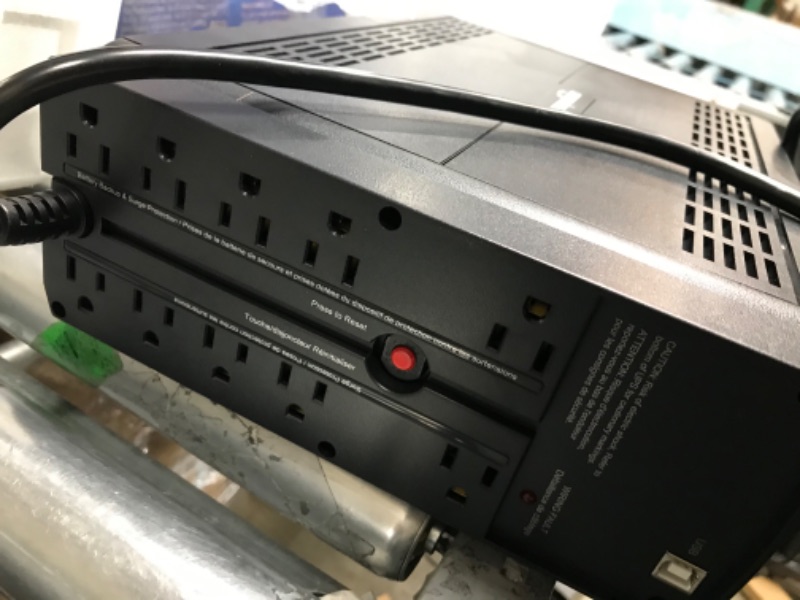 Photo 1 of Amazon Basics Line-Interactive UPS 1500VA 900 Watt Surge Protector Battery Power Backup, 10 Outlets - Black Line Interactive 10 Outlet (1500VA)