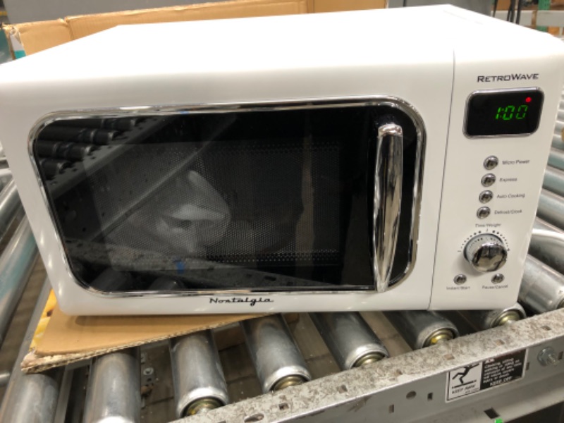 Photo 1 of **PARTS ONLY/DOES NOT HEAT*** Nostalgia Retro Compact Countertop Microwave Oven 0.7 Cu. Ft. 700-Watts with LED Digital Display, Child Lock, Easy Clean Interior, White