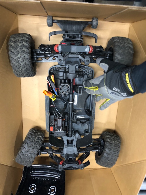 Photo 6 of **ONE OF THE FRONT PINS NEEDS TO BE REATTACHED**
ARRMA 1/10 Big Rock 4X4 V3 3S BLX Brushless Monster RC Truck RTR (Transmitter and Receiver Included, Batteries and Charger Required), Black, ARA4312V3