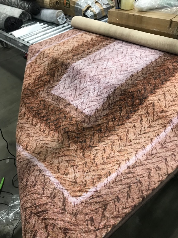 Photo 1 of 5" x 7" area rug pink/brown