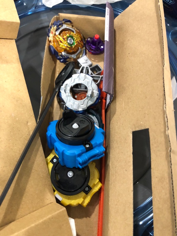 Photo 3 of BEYBLADE Burst Pro Series Evo Elite Champions Pro Set -- Complete Battle Game Set with Beystadium, 2 Battling Top Toys and 2 Launchers Frustration-Free Packaging