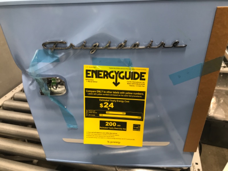 Photo 3 of **USED** DAMAGED ON THE DOOR AND ON TOP ** Frigidaire EFR176-BLUE 1.6 cu ft Blue 