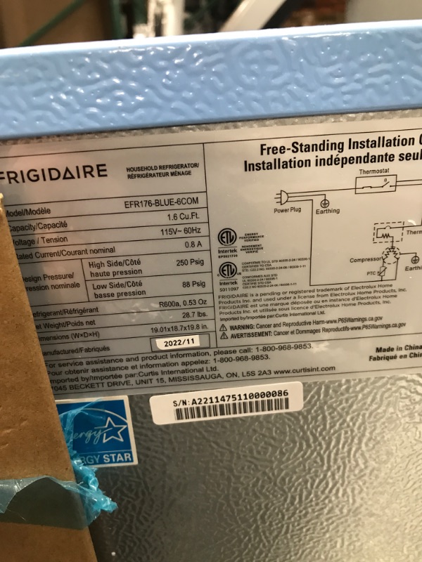 Photo 2 of **USED** DAMAGED ON THE DOOR AND ON TOP ** Frigidaire EFR176-BLUE 1.6 cu ft Blue 