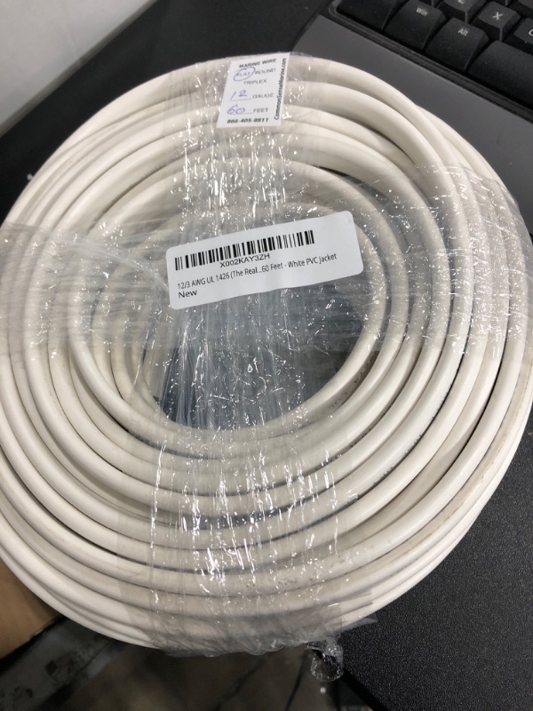 Photo 2 of 14/3 AWG UL 1426 (The Real Thing) Triplex Flat Marine Wire - Tinned Copper Boat Cable - 30 Feet - White PVC Jacket Flat 30 Feet (Coiled)