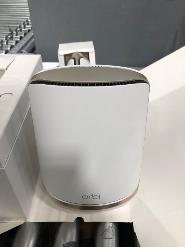 Photo 2 of NETGEAR Orbi Quad-Band WiFi 6E Mesh System (RBKE963), Router with 2 Satellite Extenders, Coverage up to 9,000 sq. ft, 200 Devices, 10 Gig Internet Port, AXE11000 802.11 Axe (Up to 10.8Gbps) WiFi 6E | 3-Pack   