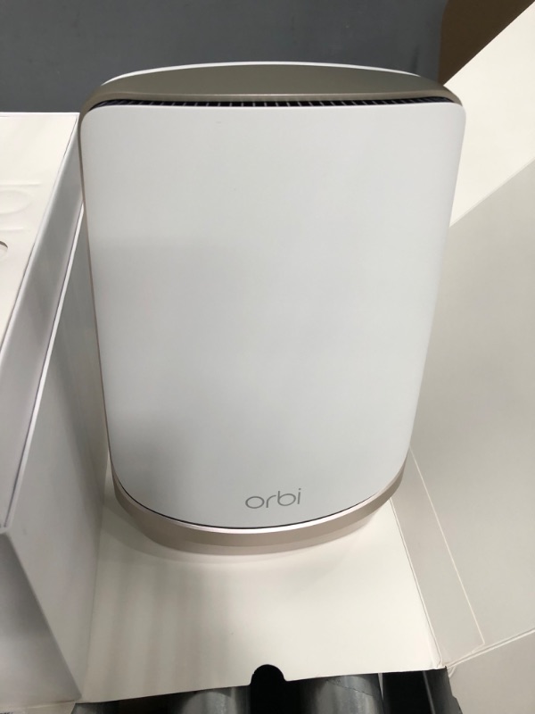 Photo 4 of NETGEAR Orbi Quad-Band WiFi 6E Mesh System (RBKE963), Router with 2 Satellite Extenders, Coverage up to 9,000 sq. ft, 200 Devices, 10 Gig Internet Port, AXE11000 802.11 Axe (Up to 10.8Gbps) WiFi 6E | 3-Pack   