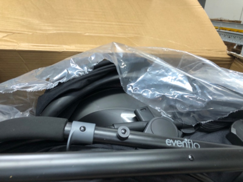 Photo 2 of Evenflo Pivot Modular Travel System With SafeMax Car Seat Only Travel System Casual Grey