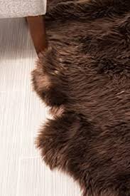 Photo 1 of 40" x 23" super area rugs natural sheep skin brown