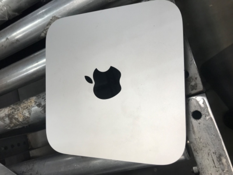 Photo 2 of **LOCKED UNABLE TO RESET***Apple Mac mini MGNR3LL/A A2348 (EMC 3569) - 2020 Specs
Available Colors	Silver
Bluetooth	Bluetooth 5.0
Ports	2x Thunderbolt 3/USB 4 ports (USB-C connector), 2x USB-A ports (up to 5Gb/s), HDMI 2.0 port, Gigabit Ethernet, and a 3.