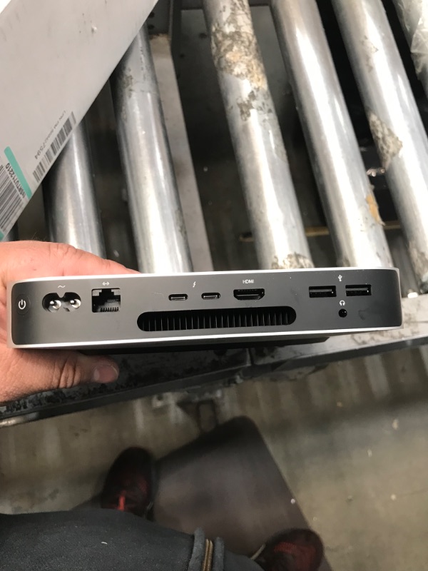 Photo 7 of **LOCKED UNABLE TO RESET***Apple Mac mini MGNR3LL/A A2348 (EMC 3569) - 2020 Specs
Available Colors	Silver
Bluetooth	Bluetooth 5.0
Ports	2x Thunderbolt 3/USB 4 ports (USB-C connector), 2x USB-A ports (up to 5Gb/s), HDMI 2.0 port, Gigabit Ethernet, and a 3.