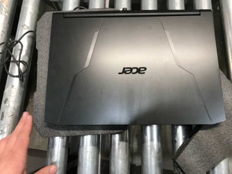 Photo 1 of PARTS ONLY DID NOT POWER ON 
Acer Nitro 5 AN515-57-59EY 15.6" Full HD 144Hz Gaming Notebook Computer, Intel Core i5-11400H 2.7GHz, 8GB RAM, 512GB SSD, NVIDIA GeForce GTX 1650 4GB, Windows 11 Home, Shale Black
