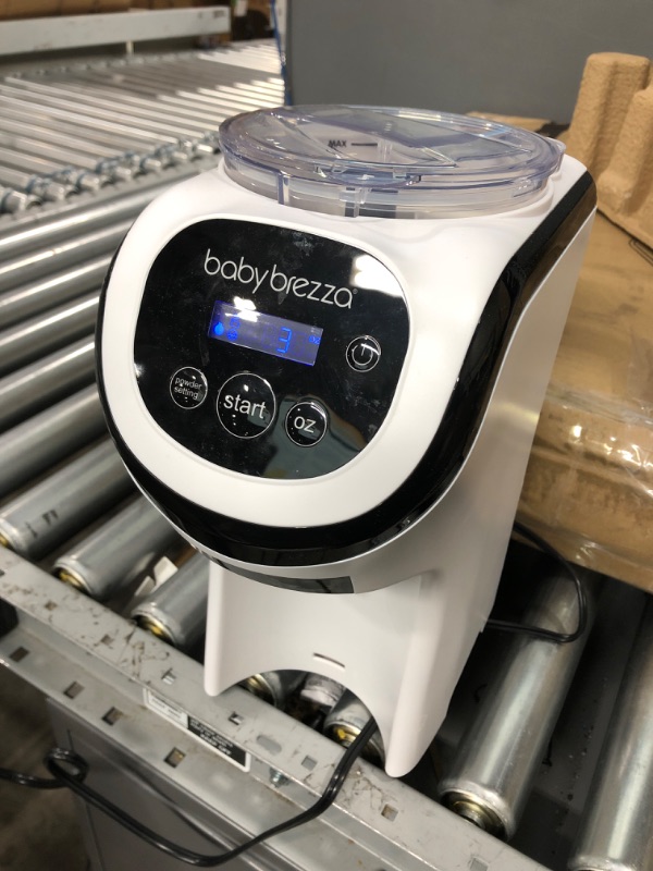 Photo 1 of Used **Baby Brezza Formula Pro Mini Baby Formula Maker – Small Baby Formula Mixer Machine Fits Small Spaces and is Portable for Travel– Bottle Makers Makes The Perfect Bottle for Your Infant On The Go