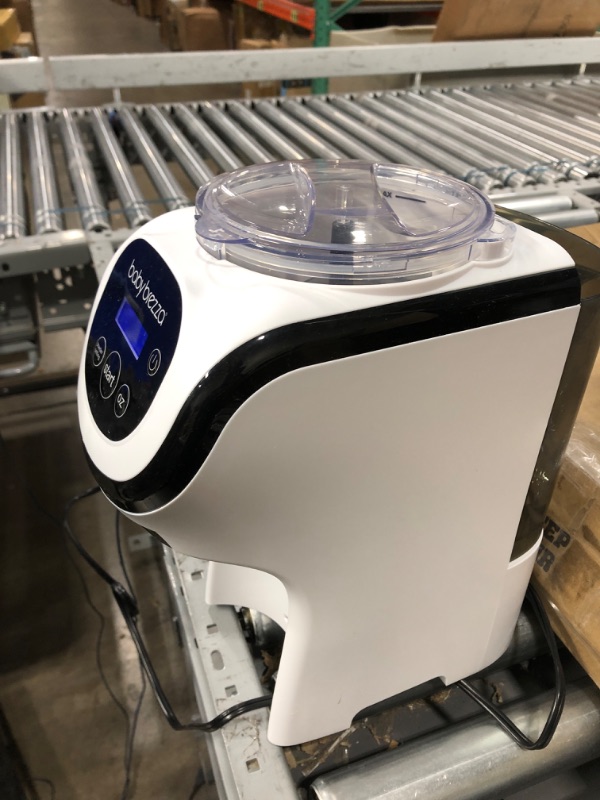 Photo 1 of Used **Baby Brezza Formula Pro Mini Baby Formula Maker – Small Baby Formula Mixer Machine Fits Small Spaces and is Portable for Travel– Bottle Makers Makes The Perfect Bottle for Your Infant On The Go