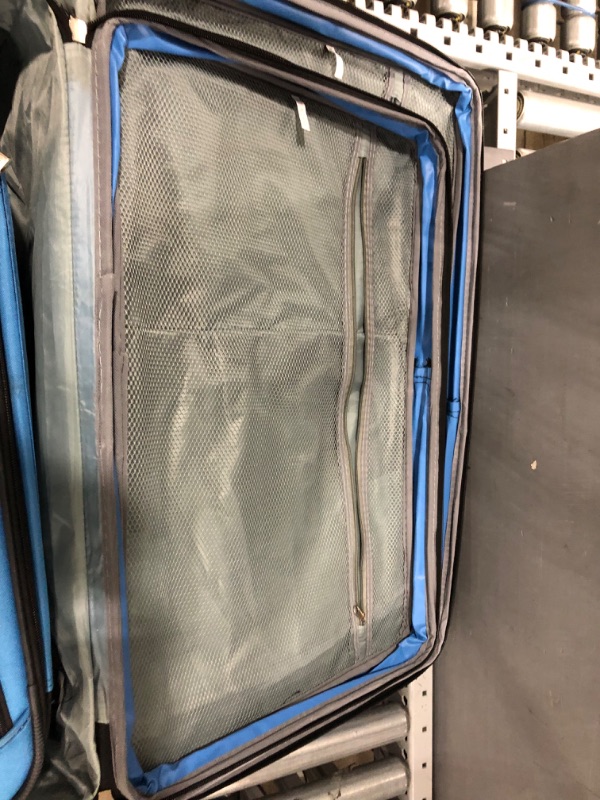 Photo 17 of **KEYS ARE IN POCKET TO LARGER SUITCASE, BRAND TAG IS FALLING OFF. SEE PHOTOS**
Rockland Journey Softside Upright Luggage Set, Blue, 4-Piece (14/19/24/28) 4-Piece Set (14/19/24/28) Blue