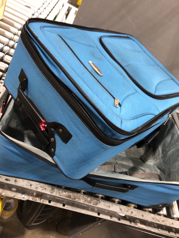 Photo 8 of **KEYS ARE IN POCKET TO LARGER SUITCASE, BRAND TAG IS FALLING OFF. SEE PHOTOS**
Rockland Journey Softside Upright Luggage Set, Blue, 4-Piece (14/19/24/28) 4-Piece Set (14/19/24/28) Blue