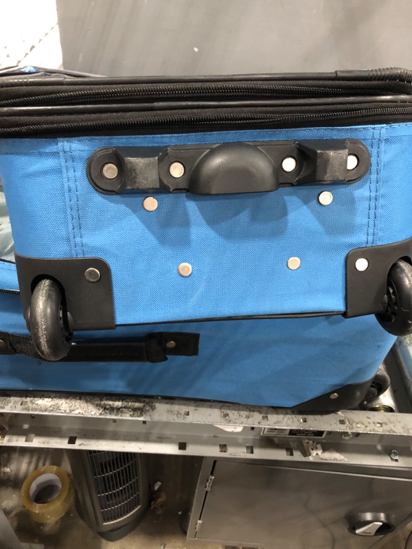 Photo 4 of **KEYS ARE IN POCKET TO LARGER SUITCASE, BRAND TAG IS FALLING OFF. SEE PHOTOS**
Rockland Journey Softside Upright Luggage Set, Blue, 4-Piece (14/19/24/28) 4-Piece Set (14/19/24/28) Blue