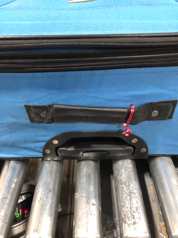 Photo 6 of **KEYS ARE IN POCKET TO LARGER SUITCASE, BRAND TAG IS FALLING OFF. SEE PHOTOS**
Rockland Journey Softside Upright Luggage Set, Blue, 4-Piece (14/19/24/28) 4-Piece Set (14/19/24/28) Blue