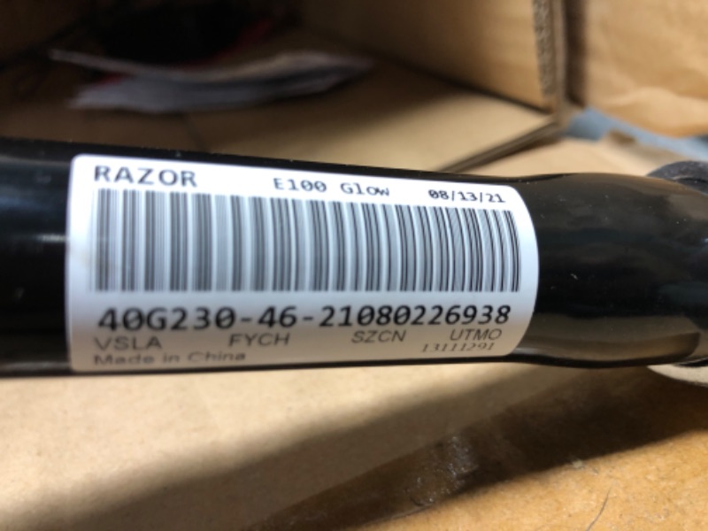 Photo 4 of ***TESTED/ TURNS ON*** Razor E100 Electric Scooter for Kids Ages 8+ - 8" Pneumatic Front Tire, Hand-Operated Front Brake, Up to 10 mph and 40 min of Ride Time, For Riders up to 120 lbs