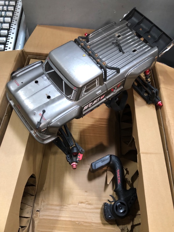 Photo 2 of *HEAVILY USED** GREY ARRMA RC Truck 1/8 Outcast 6S BLX 4WD Extreme Bash Stunt Truck RTR (Battery and Charger Not Included), Black, ARA8710

