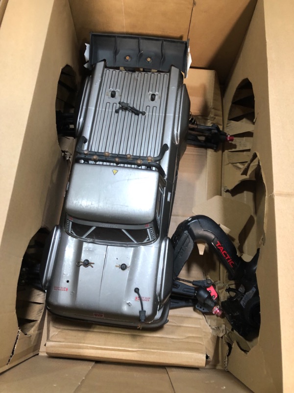 Photo 4 of *HEAVILY USED** GREY ARRMA RC Truck 1/8 Outcast 6S BLX 4WD Extreme Bash Stunt Truck RTR (Battery and Charger Not Included), Black, ARA8710

