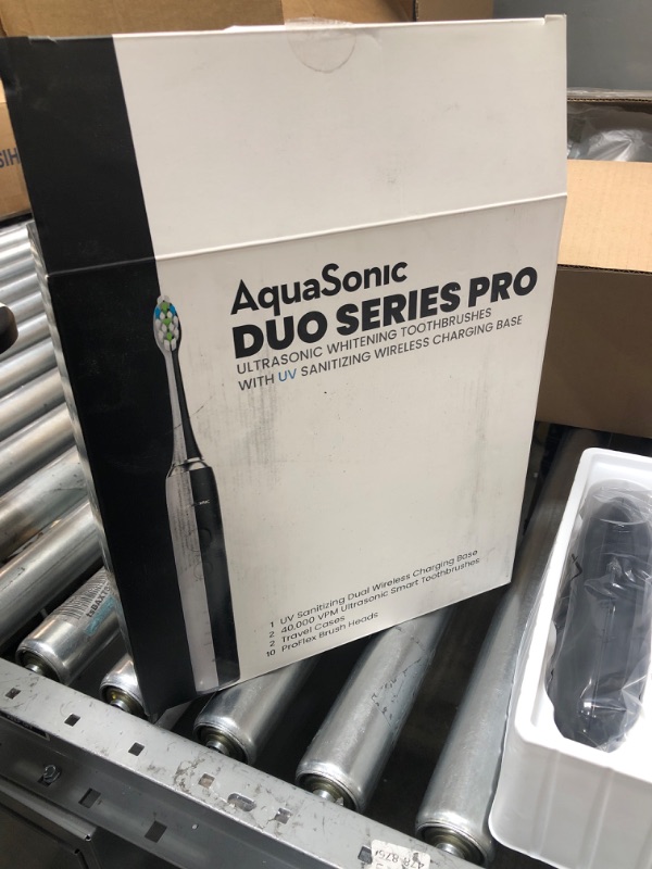 Photo 4 of AquaSonic DUO PRO – Ultra Whitening 40,000 VPM Electric Smart ToothBrushes – ADA Accepted - 4 Modes with Smart Timers - UV Sanitizing & Wireless Charging Base - 10 ProFlex Brush Heads & 2 Travel Cases