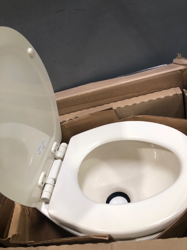 Photo 3 of Dometic 302310033 310 Series Standard Height Toilet 19.75" Height, Slow Close Wood Seat, Bone Bone Standard Height Toilet