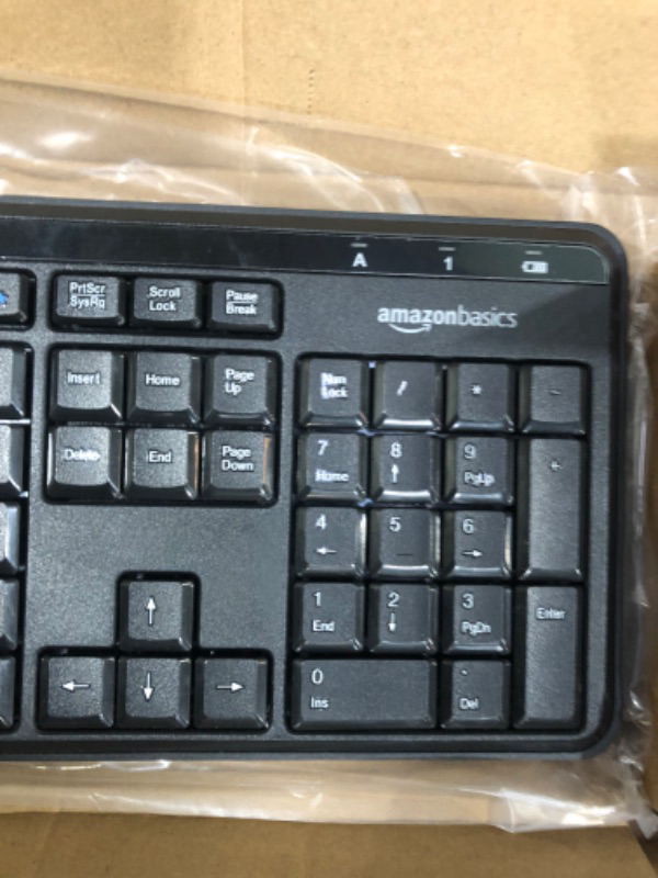 Photo 3 of Amazon Basics Wireless Computer Keyboard and Mouse Combo - Quiet and Compact - US Layout (QWERTY)
