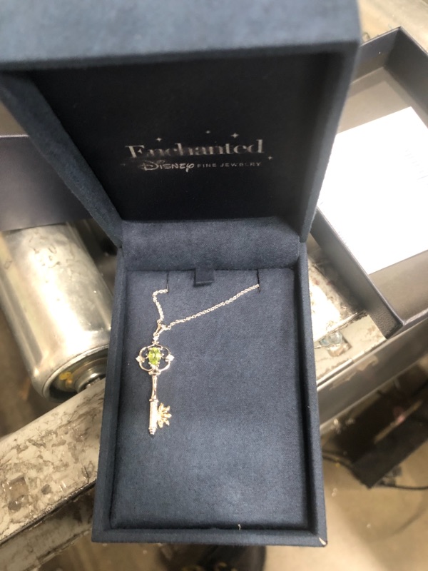 Photo 2 of Enchanted Disney Fine Jewelry Sterling Silver and 10K Yellow Gold 6x4MM Pear Cut Peridot and 1/20 Cttw Natural White Round Diamonds Tiana Water Lily Key Pendant Necklace