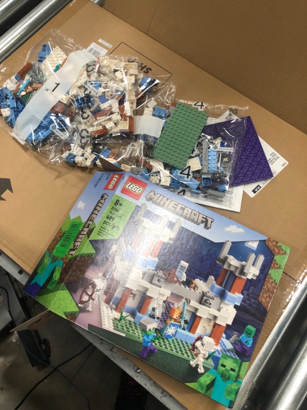 Photo 2 of LEGO Minecraft The Ice Castle 21186 Building Toy Set for Kids, Girls,and Boys Ages 8+(499 Pieces), Multicolor