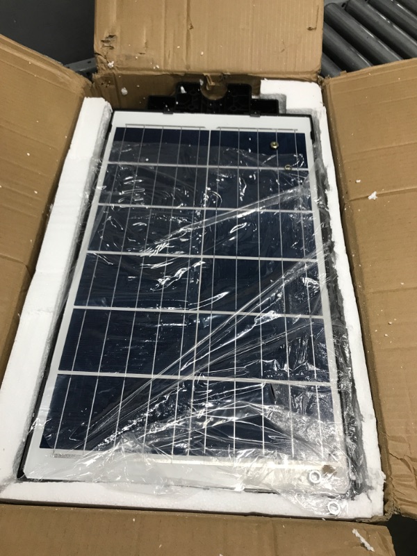 Photo 2 of ****USED AND UNABLE TO TEST***  1000W Solar Street Light, 80000LM Waterproof Solar Security Flood Lights Outdoor Motion Sensor, Dusk to Dawn Solar LED Lights Lamp with Remote Control & Arm Bracket for Garden,Yard, Path, Parking Lot Black 1000W