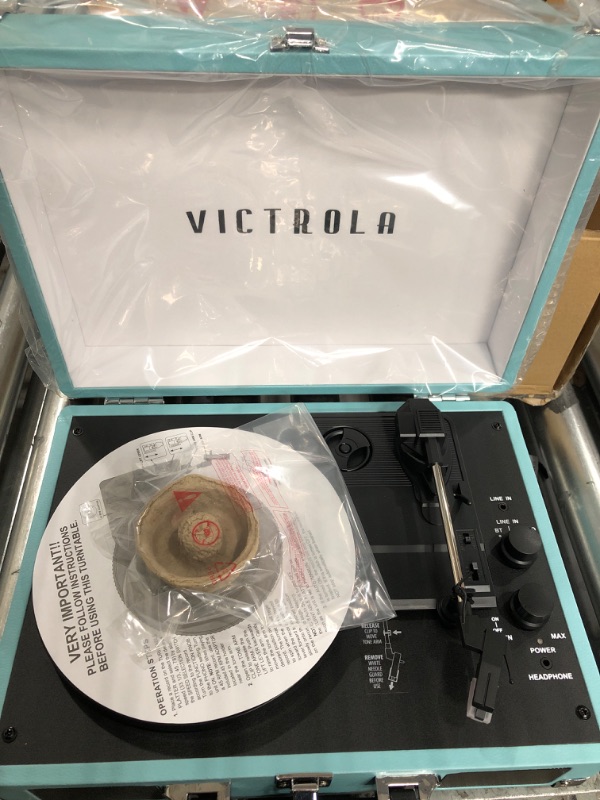 Photo 4 of Victrola Vintage 3-Speed Bluetooth Portable Suitcase Record Player with Built-in Speakers | Upgraded Turntable Audio Sound| Includes Extra Stylus | Turquoise, Model Number: VSC-550BT