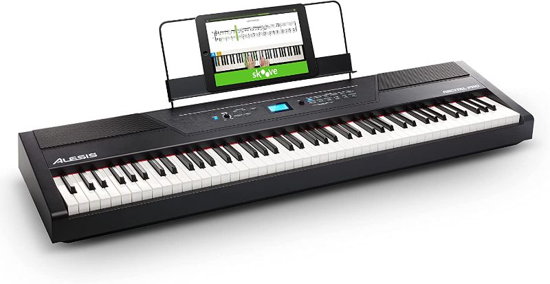 Photo 1 of Alesis Recital Pro - 88 Key Digital Piano Keyboard with Hammer Action Weighted Keys, 2x20W Speakers, 12 Voices, Record and Lesson Mode, FX and Display
