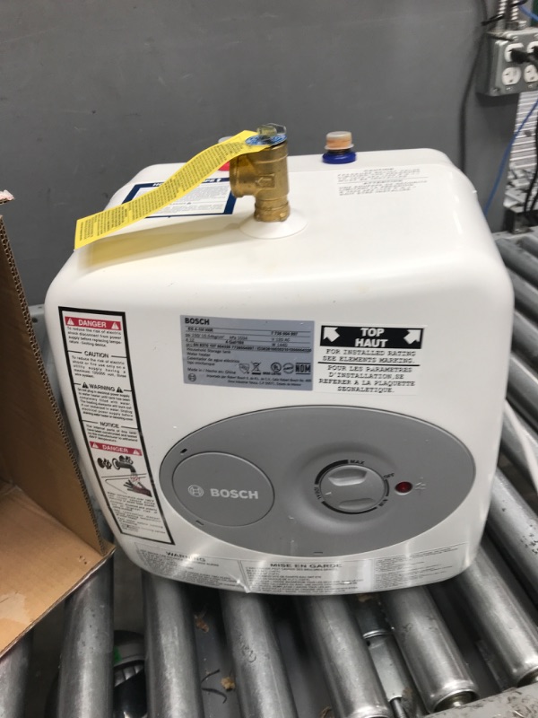 Photo 2 of *HEAVILY USED* Bosch Electric Mini-Tank Water Heater Tronic 3000 T 4-Gallon (ES4) - Eliminate Time for Hot Water - Shelf, Wall or Floor Mounted 4 Gallon