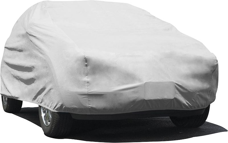 Photo 1 of *WEATHER DAMAGED*
*VERY USED*
*NOT EXACT SIZE*

Budge Lite SUV Cover Dirtproof, Scratch Resistant, Breathable, Dustproof, Fits S.U.Vs up to 162", Gray
