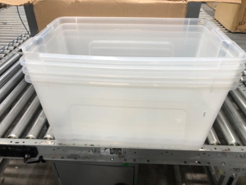 Photo 2 of *1 BIN IS CRACKED,NO LIDS*
IRIS USA 72 Qt. Plastic Storage Bin Tote Organizing Container with Durable Lid and Secure Latching Buckles, Stackable and Nestable, 4 Pack, clear with Black Buckle g) 72 Qt. - 4 Pack