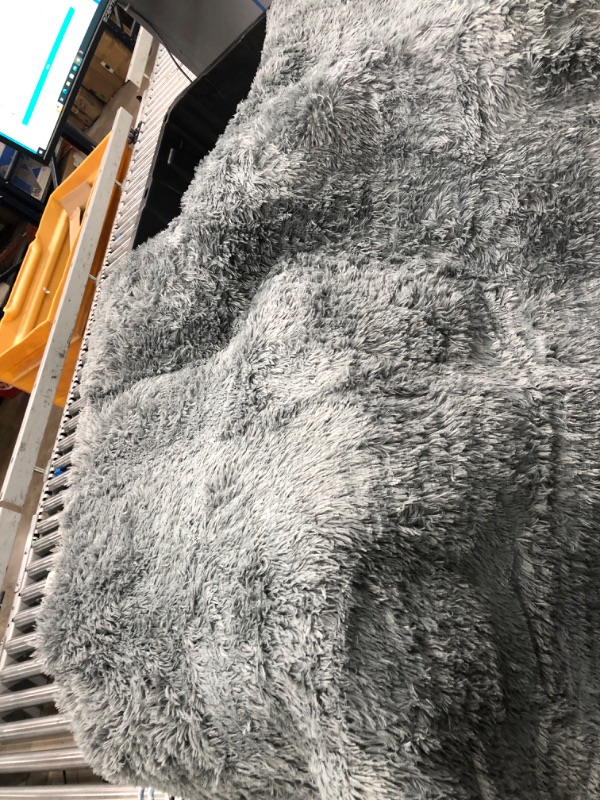 Photo 1 of 2 (70X 40) GRAY FUZZY RUGS 