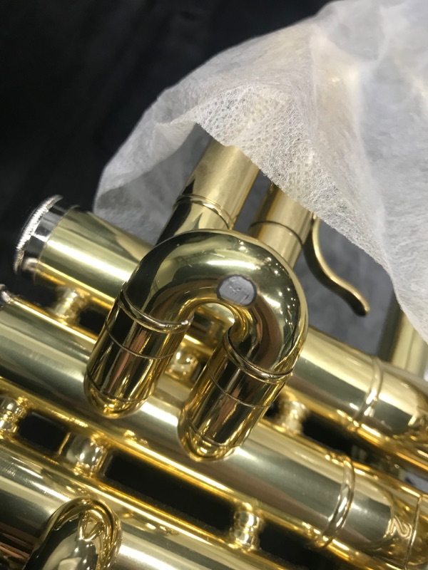 Photo 5 of ***MINOR DAMAGE**  JUUXAAN Brass Standard Bb Trumpet Instrument with Hard Case,Gloves, 7C Mouthpiece for Student Beginner (golden)