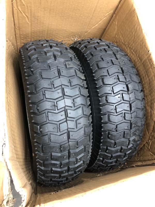 Photo 2 of (2-Pack) 16x6.50-8 Pneumatic Tires on Rim - Universal Fit Riding Mower and Yard Tractor Wheels - With Chevron Turf Treads - 3” Centered Hub and 3/4” Bushings - 615 lbs Max Weight Capacity