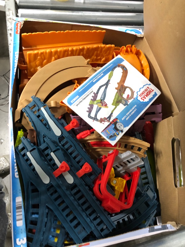 Photo 2 of Fisher-Price Thomas and Friends Train Set with Loop the Loop Action, Thomas Motorized Toy Train, Carly the Crane, Maintenance Yard? Standard Launch & Loop Set