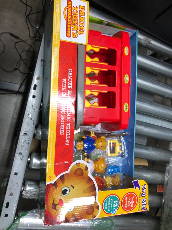 Photo 2 of Daniel Tiger's Neighborhood Deluxe Electronic Trolley Includes 5 Family Figures with Lights, Sounds, Music & Crosswalk Accessories! [Amazon Exclusive]