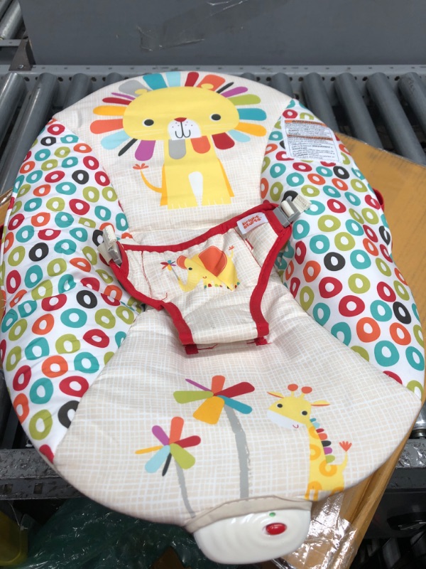 Photo 2 of Bright Starts Playful Pinwheels Portable Baby Bouncer with Vibrating Infant Seat and-Toy Bar, 19.8x13.1x3.4 Inch, Age 0-6 Months