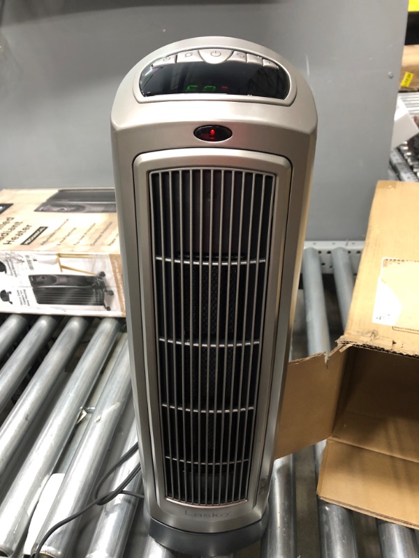 Photo 3 of *** POWERS ON *** Lasko Oscillating Digital Ceramic Tower Heater for Home with Adjustable Thermostat, Timer and Remote Control, 23 Inches, 1500W, Silver, 755320