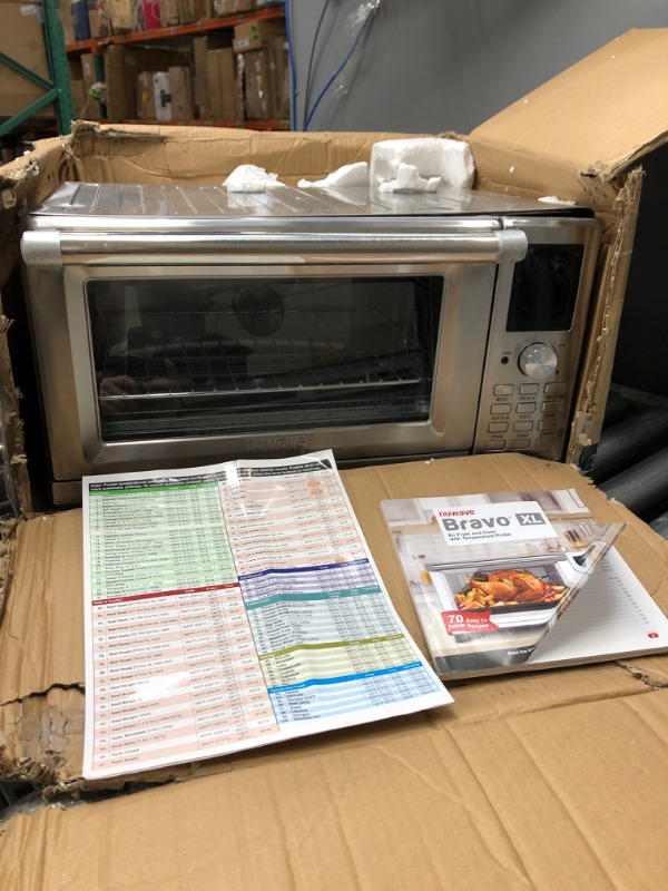 Photo 2 of ***item has minor damage on top amd dent of top as well see photos***
NUWAVE Bravo Air Fryer Toaster Smart Oven, 12-in-1 Countertop Convection, 30-QT XL Capacity, 50°-500°F Temperature Controls, Top and Bottom Heater Adjustments 0%-100%, Brushed Stainless