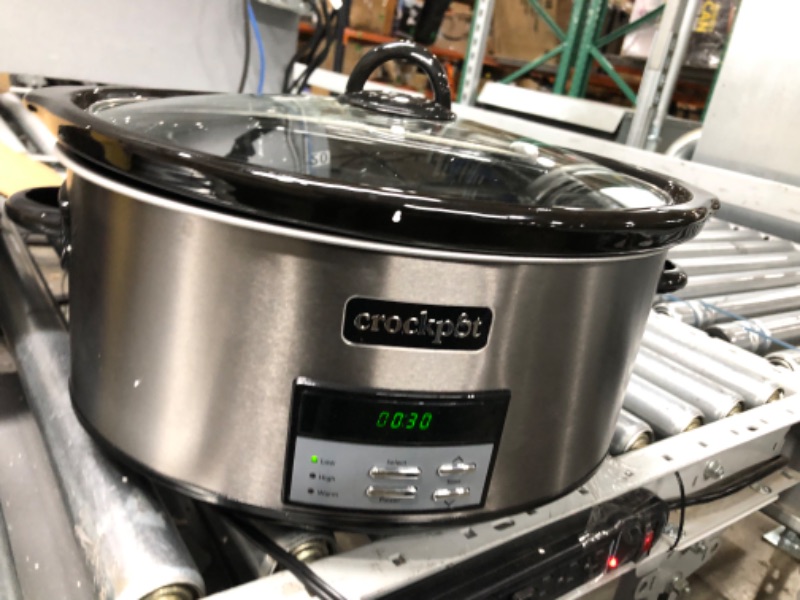 Photo 2 of **SEE NOTES**
Crockpot 8 Quart Slow Cooker with Auto Warm Setting and Cookbook, Black Stainless Steel